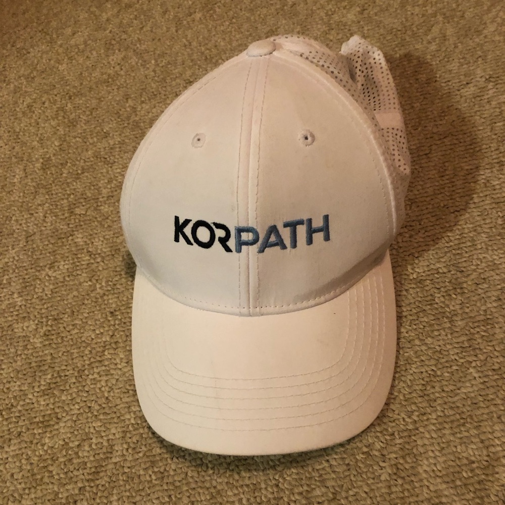 White branded baseball cap
